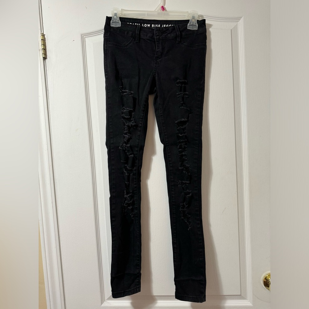 3 pairs- 2 pair black leggings/jeans, 1 pair blue